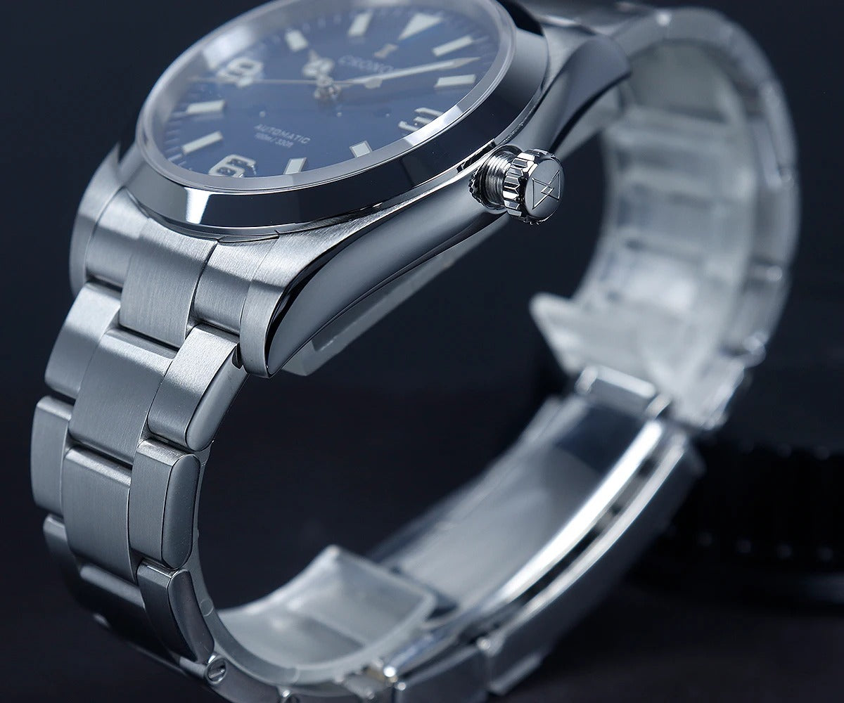Angled Cronos L6031 product photograph showing a blue dial, crown and steel case profile